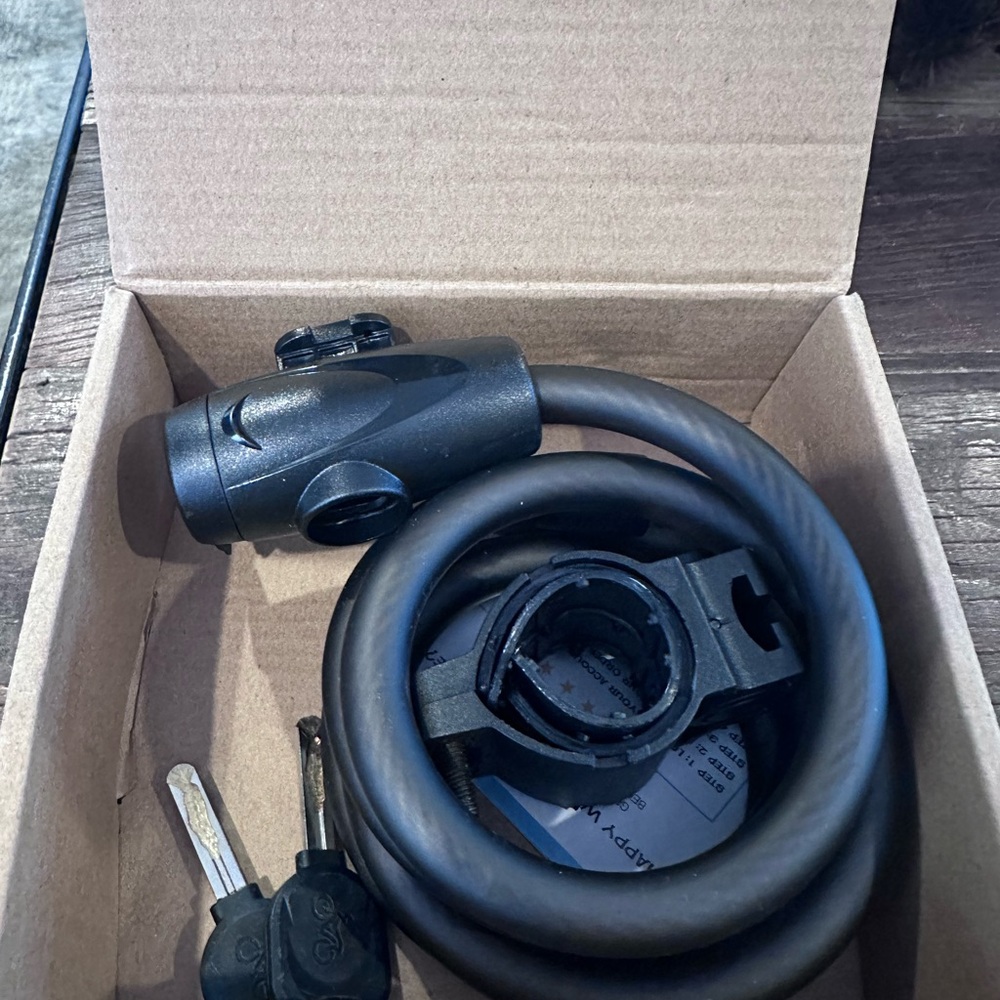Titanker Black Coiled Cable Lock with Keys for bikes and more